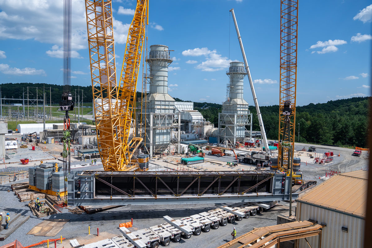 crews connect HRGS component to cranes